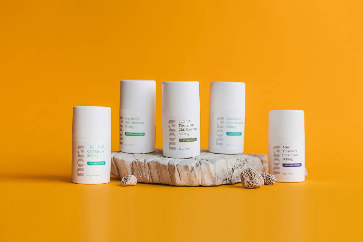 Close-up of ingredient labels on organic skincare jars