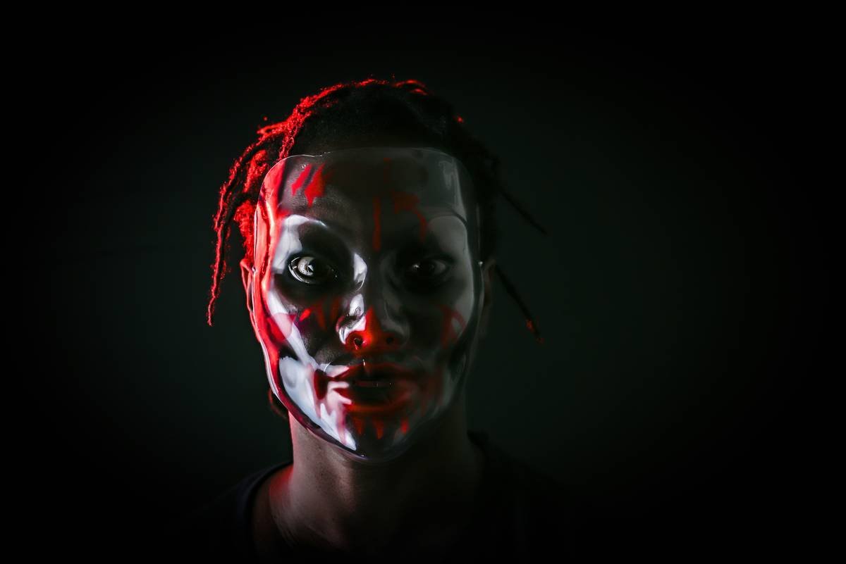 a person with a mask