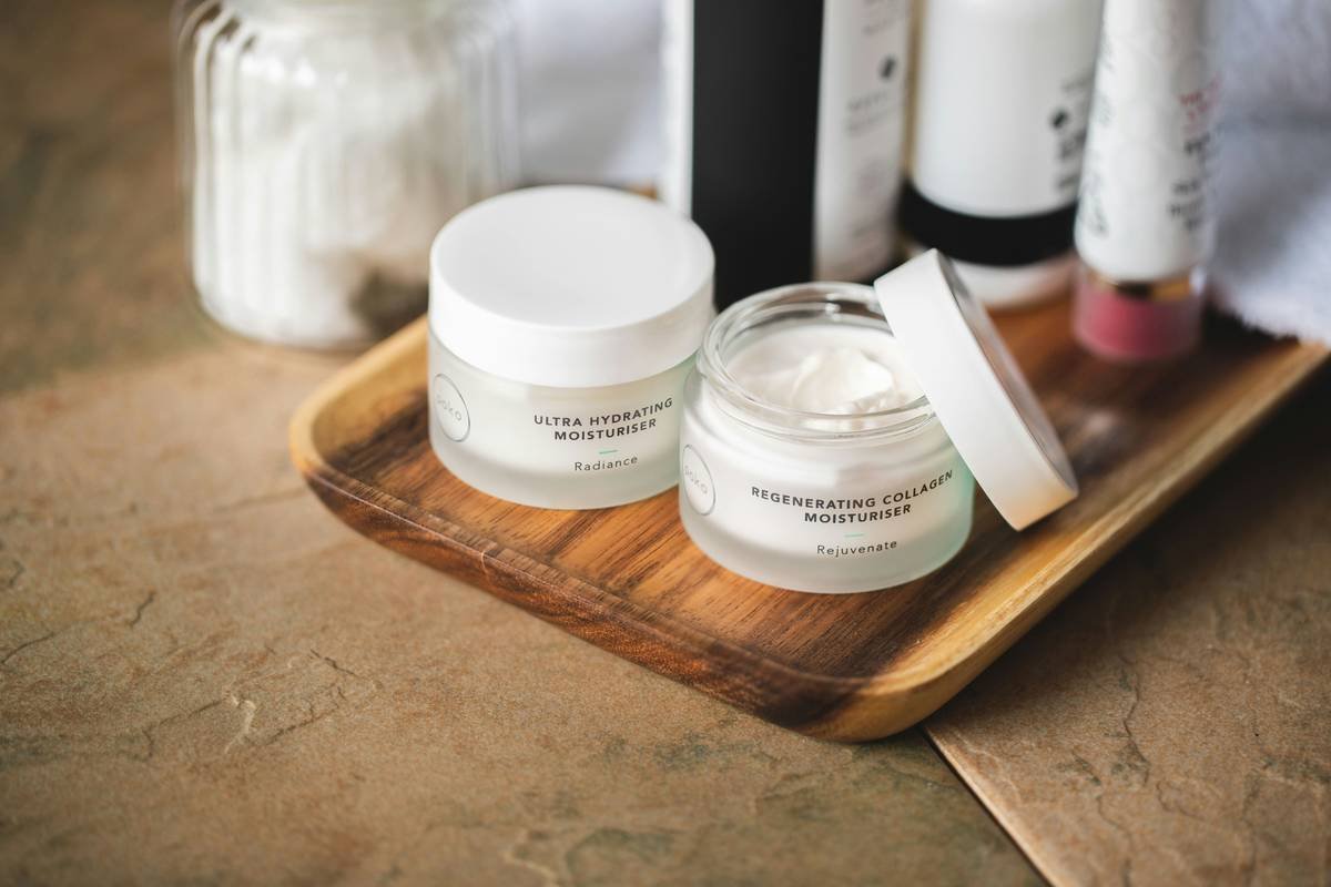 Skincare products on bathroom shelf