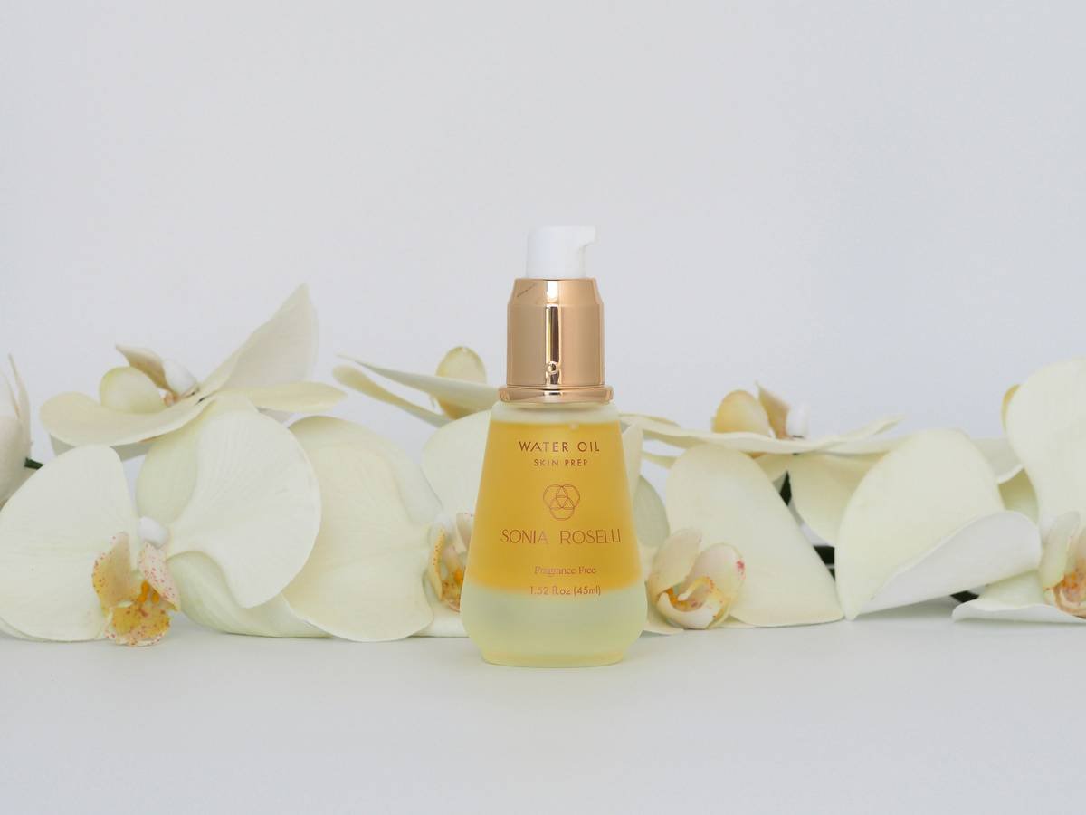 Sonia Roselli Water Oil Facial Moisturizer. Skin care routine. Beauty with nature and flowers.